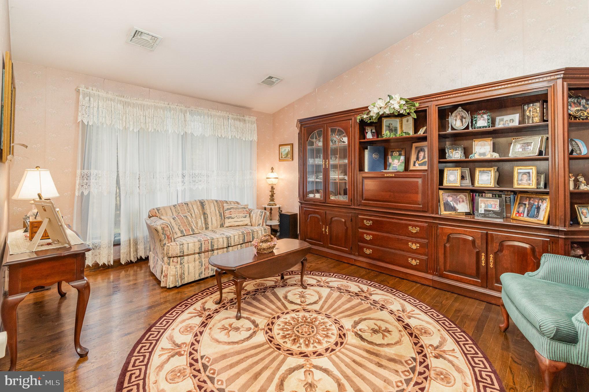 48 Turnpike Road Ashland, PA 17921 - Photo 5 of 60 a living room with furniture and a wooden floor