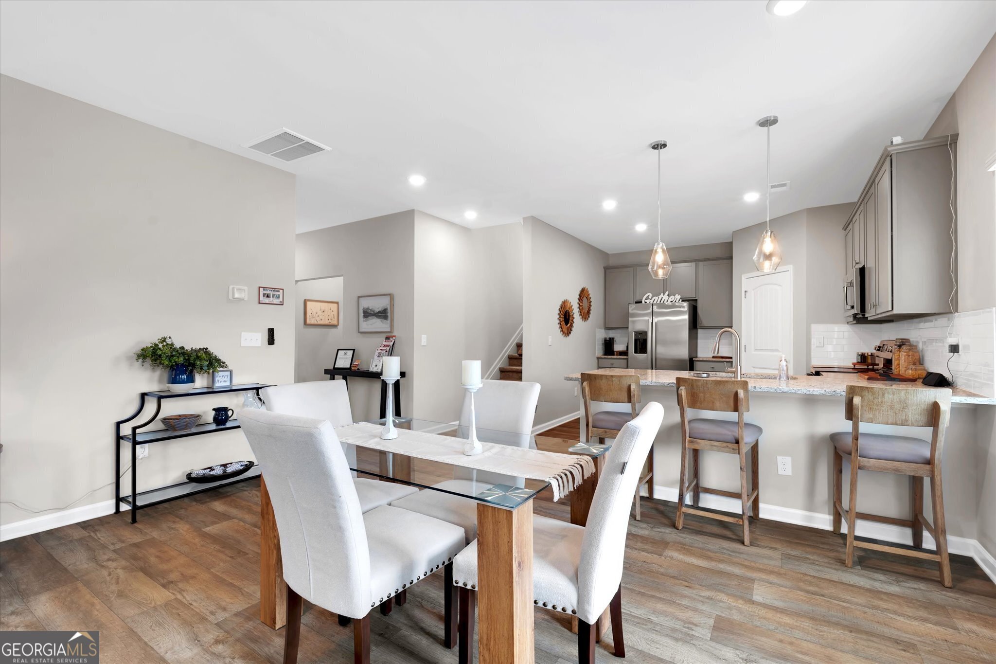 304 Rusty Plow Lane, Unit 22 Perry, GA 31069 - Photo 7 of 25 a view of a dining room with furniture