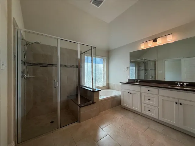 a view of swimming pool with outdoor seating and a patio