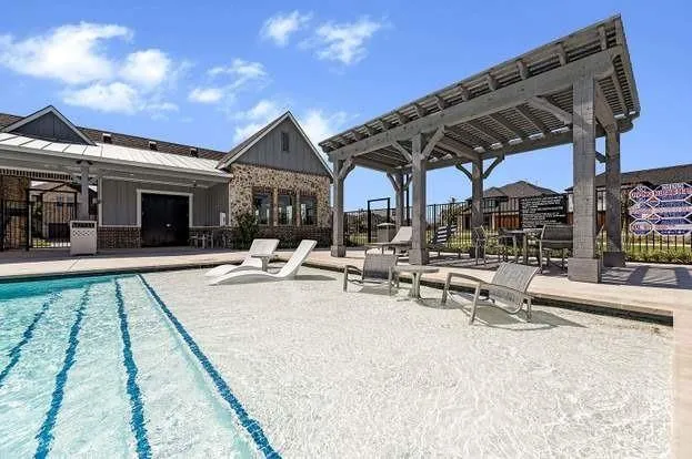 an aerial view of a house with a ocean view