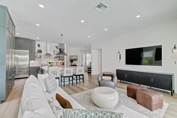 a bedroom with a bed and a bathroom