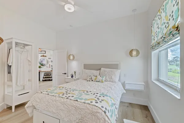 a utility room with sink dryer and washer