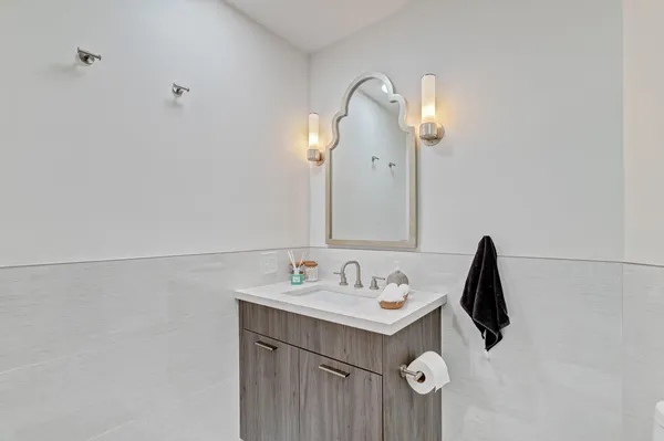 a house view with a sitting space and garden space