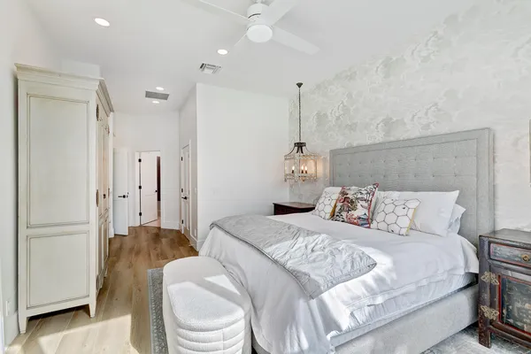 a view of a house with pool and a yard