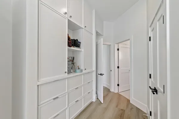 a view of a house with swimming pool and sitting area