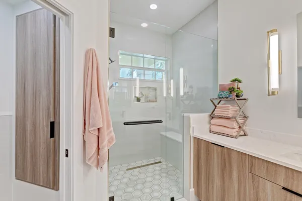 a view of a lake with a garden and deck