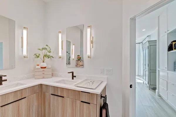 a view of a lake with a house in the background