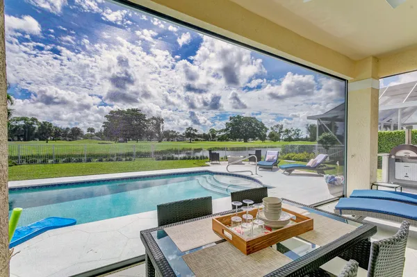 a view of a lake with a big yard