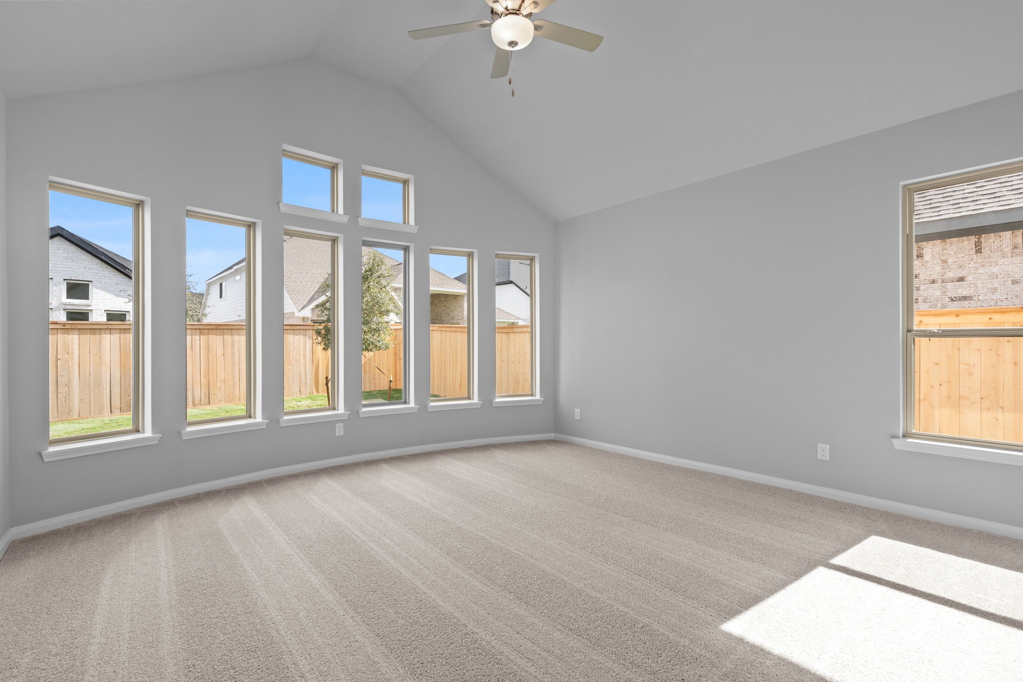 10726 Rattlebox Court Cypress, TX 77433 - Photo 19 of 36 a view of an empty room with a window
