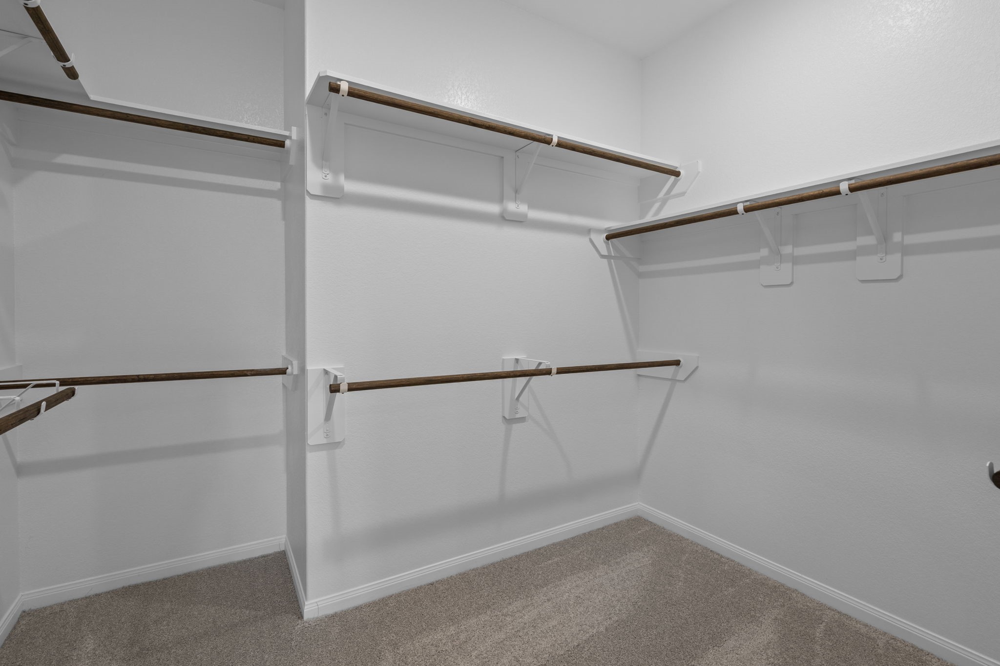 10726 Rattlebox Court Cypress, TX 77433 - Photo 24 of 36 a view of an empty walk in closet