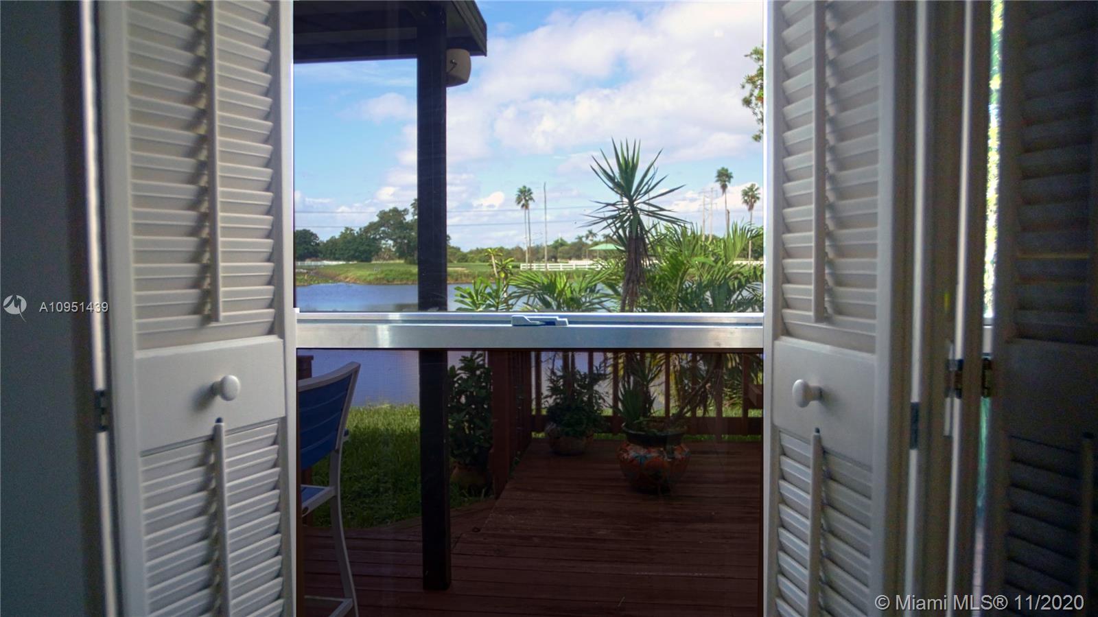 4709 Grapevine Way Davie, FL 33331 - Photo 11 of 41 The view from the dining room.