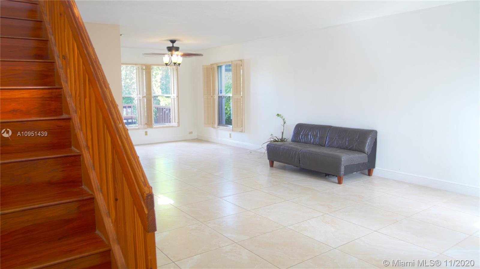 4709 Grapevine Way Davie, FL 33331 - Photo 13 of 41 Living room and ding room that overlooks the lake.