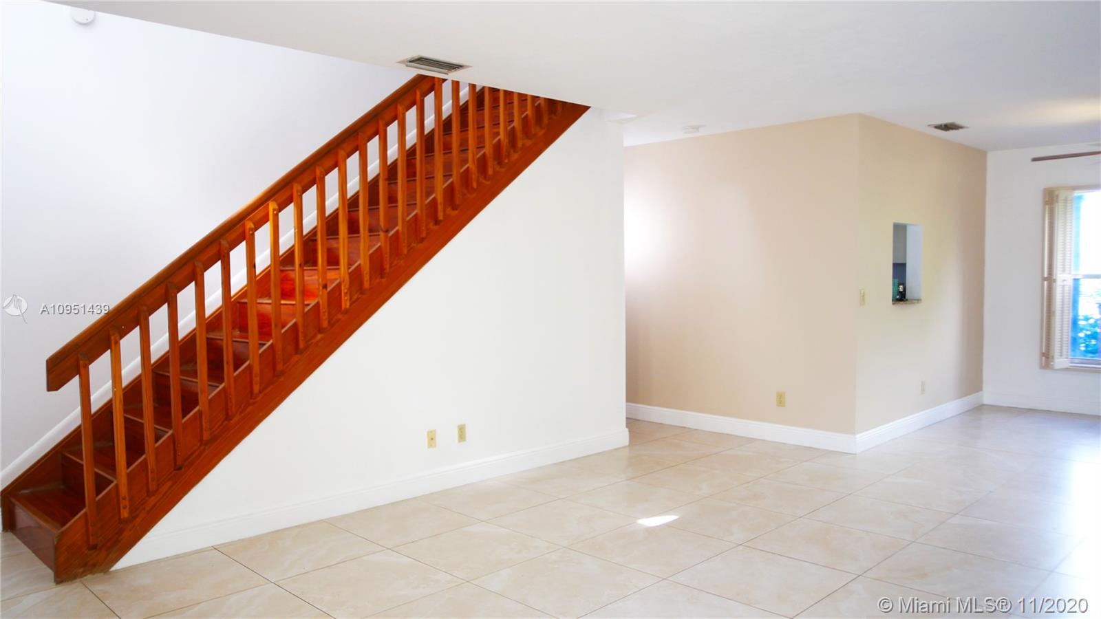 4709 Grapevine Way Davie, FL 33331 - Photo 16 of 41 Stairway to bedrooms from living room.