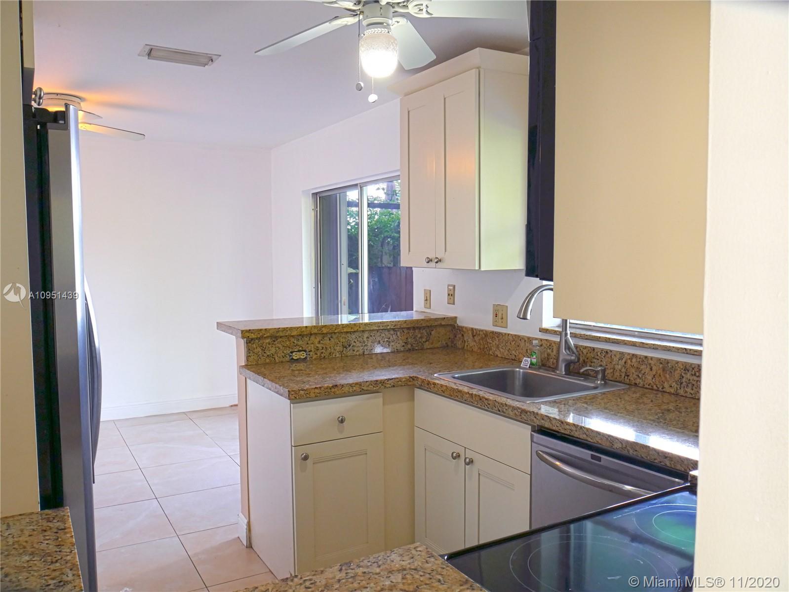 4709 Grapevine Way Davie, FL 33331 - Photo 19 of 41 Another view of kitchen.