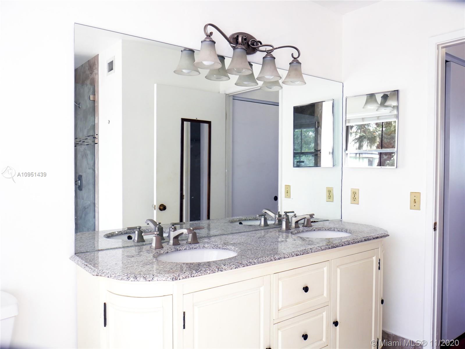 4709 Grapevine Way Davie, FL 33331 - Photo 28 of 41 Master bathroom dual sink vanity.