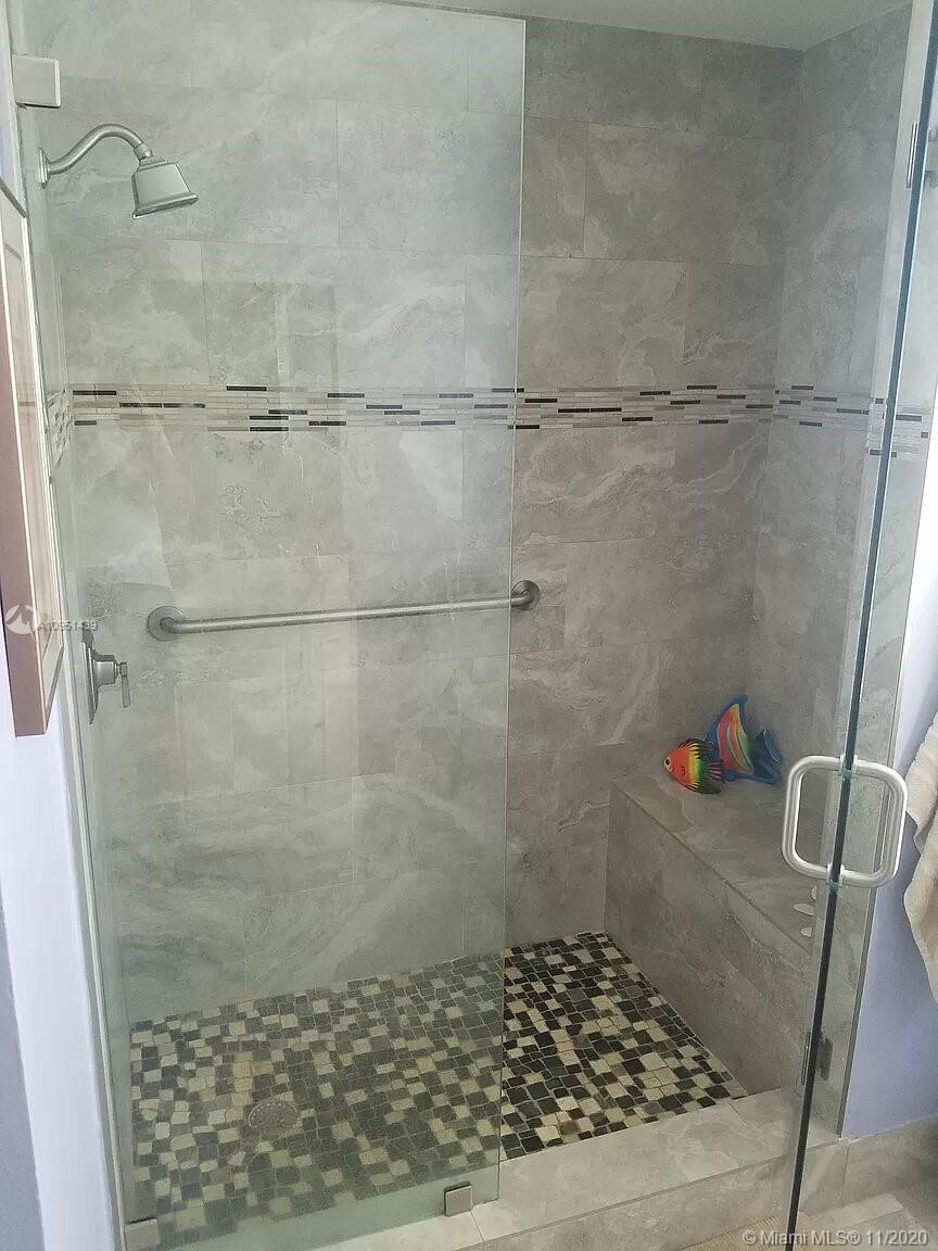 4709 Grapevine Way Davie, FL 33331 - Photo 29 of 41 Remodeled master bathroom shower.