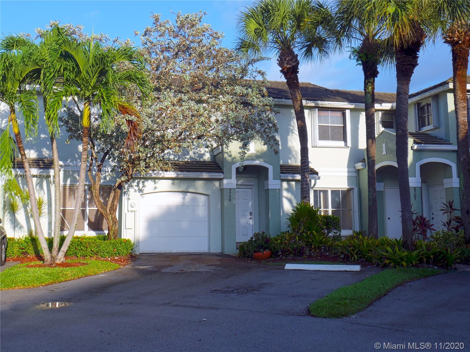 4709 Grapevine Way Davie, FL 33331 - Photo 35 of 41 Front entrance with 2 assigned parking spaces.