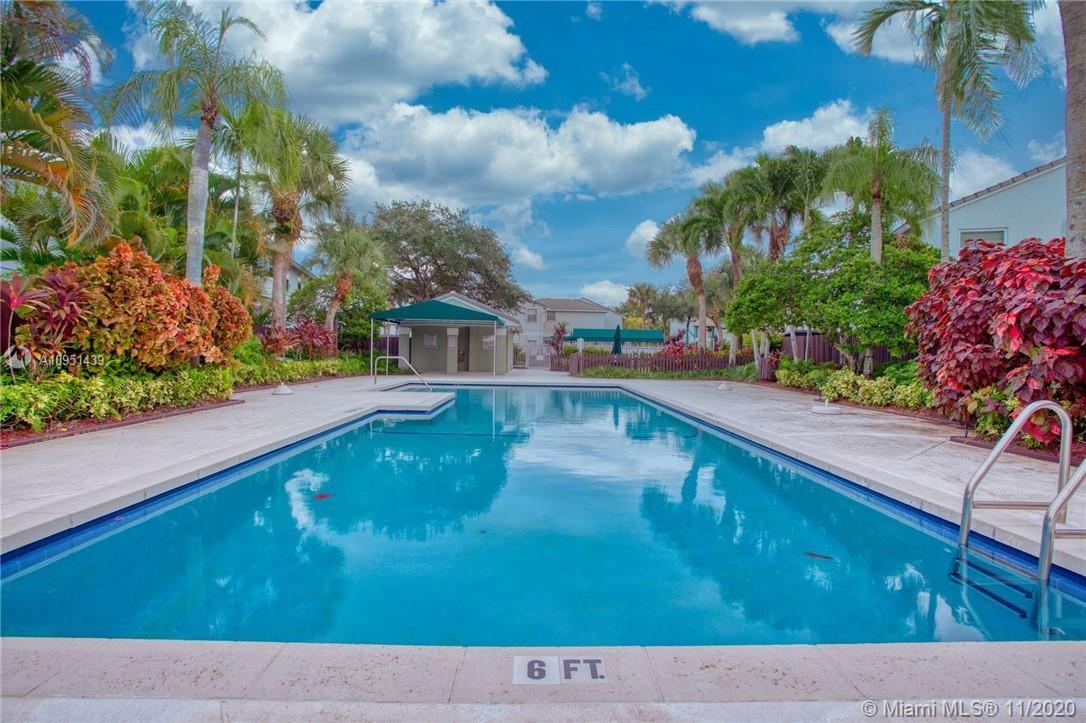 4709 Grapevine Way Davie, FL 33331 - Photo 40 of 41 Community pool, it overlooks the wide lake
