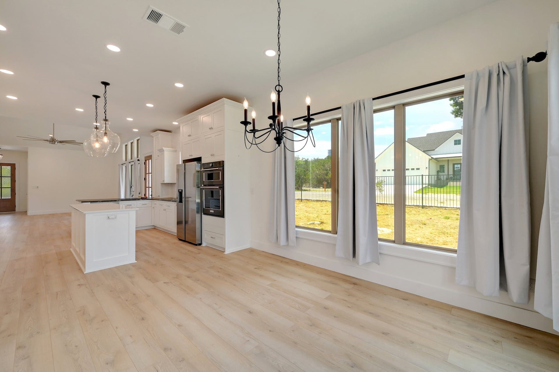2 Cherokee Trail Wimberley, TX 78676 - Photo 11 of 26 a view of an empty room with kitchen and a window