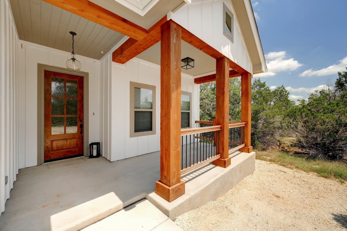 2 Cherokee Trail Wimberley, TX 78676 - Photo 2 of 26 a view of a porch with a backyard