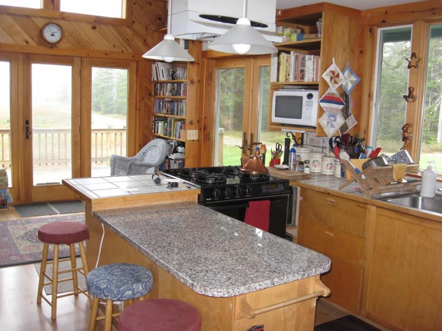 112 Marshville Road Harrington, ME 04643 - Photo 4 of 11 Kitchen w/bar seating, View of deck....