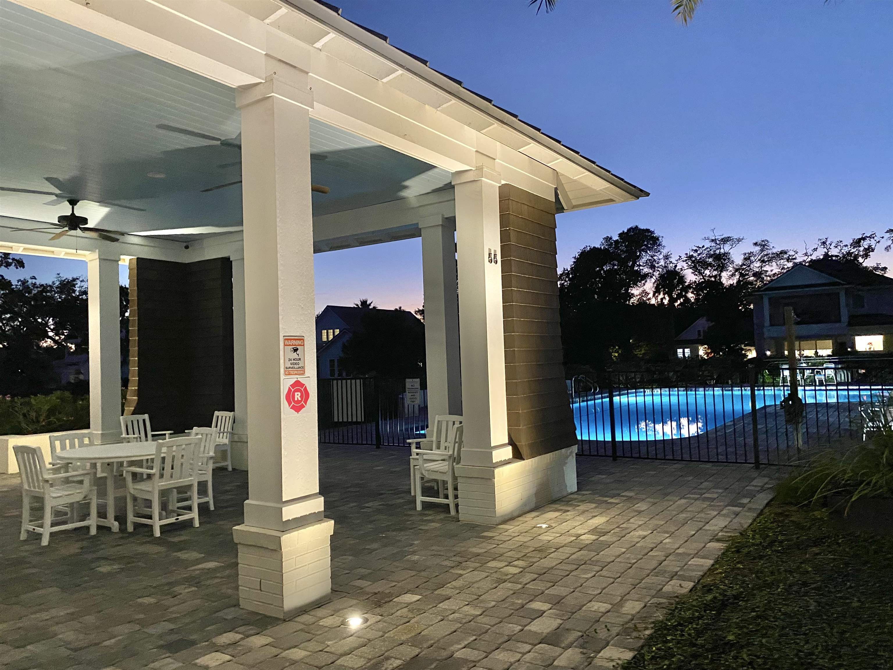 489 Ridgeway Road St. Augustine, FL 32080 - Photo 13 of 20 a building outdoor space with patio furniture and potted plants