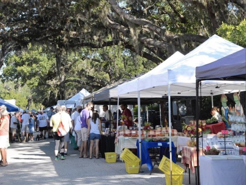 489 Ridgeway Road St. Augustine, FL 32080 - Photo 19 of 20 a view of people sitting in front of retail shop