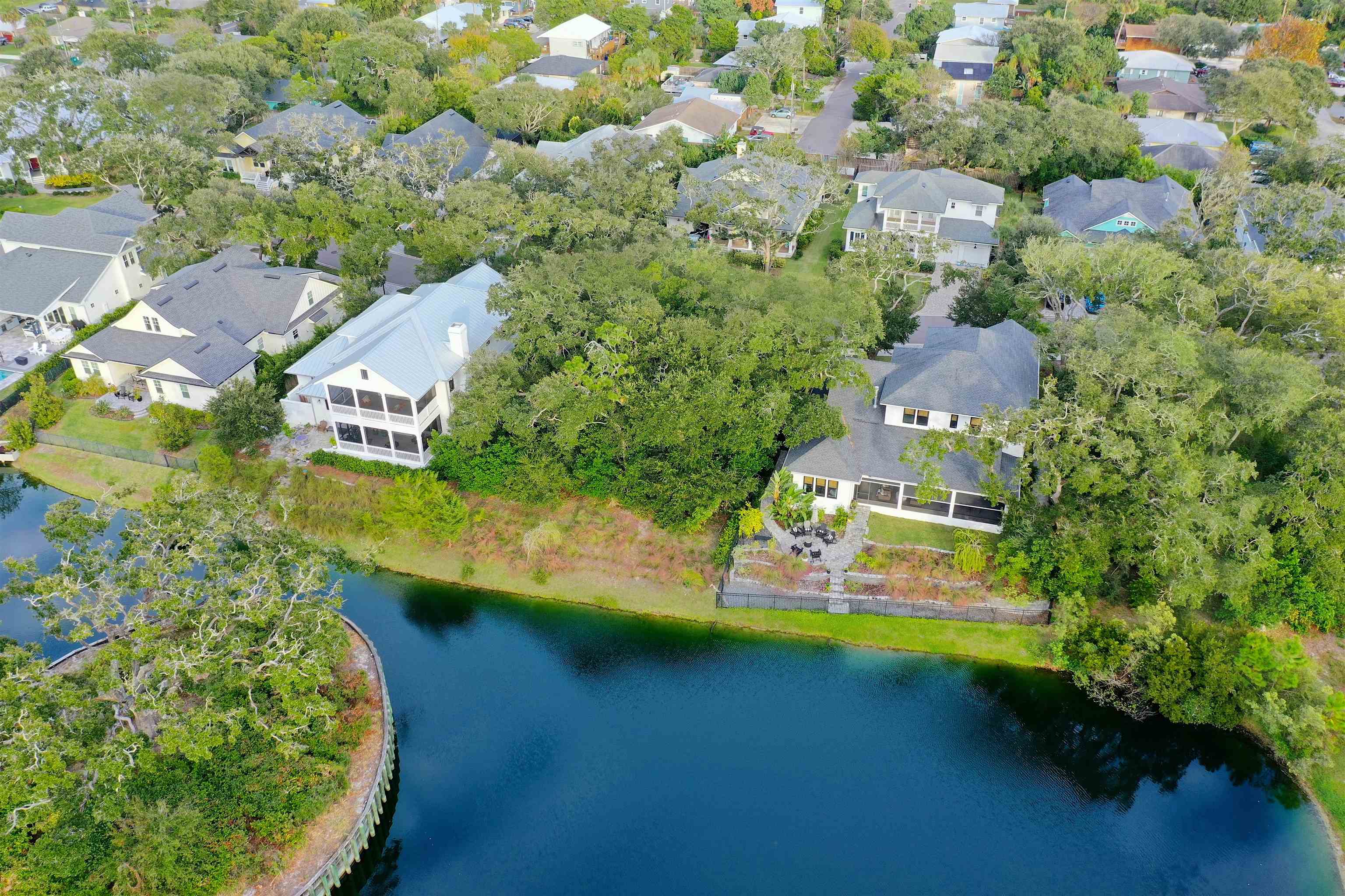 489 Ridgeway Road St. Augustine, FL 32080 - Photo 2 of 20 an aerial view of a house with a yard basket ball court and outdoor seating