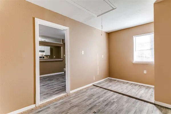 a view of kitchen and wooden floor