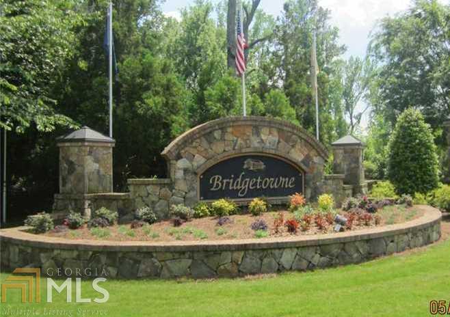 5210 Rialto Way, Unit 433 Cumming, GA 30040 - Photo 1 of 1 a view of a garden with a fountain and a fountain