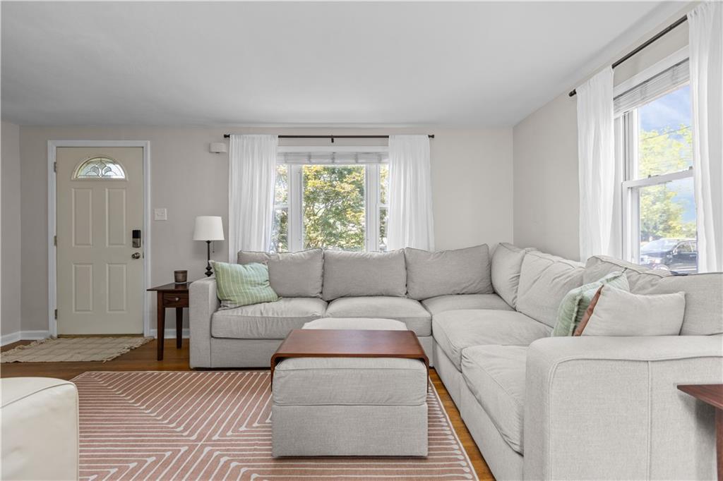 56 Elizabeth Street Pittsburgh, PA 15209 - Photo 12 of 30 a living room with furniture and a window