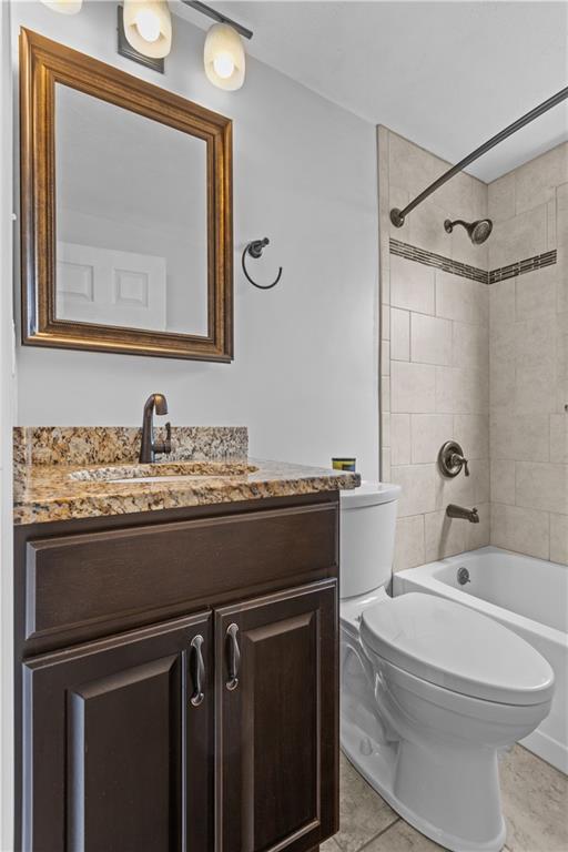 56 Elizabeth Street Pittsburgh, PA 15209 - Photo 18 of 30 a bathroom with a granite countertop toilet sink and mirror