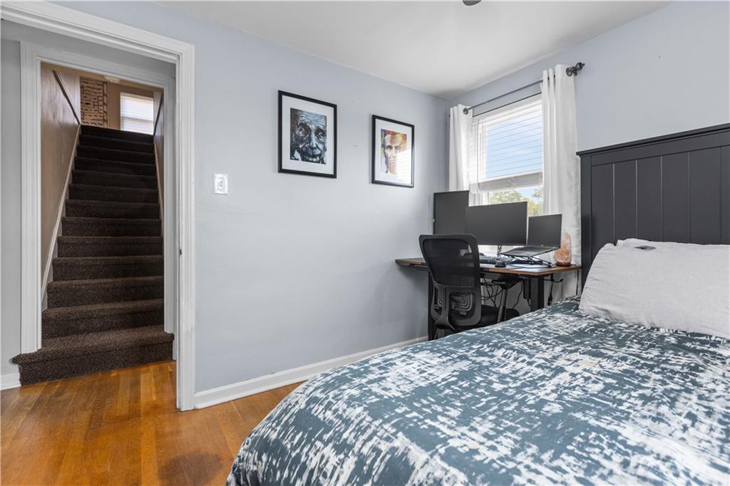 56 Elizabeth Street Pittsburgh, PA 15209 - Photo 20 of 30 a bedroom with a bed and a window