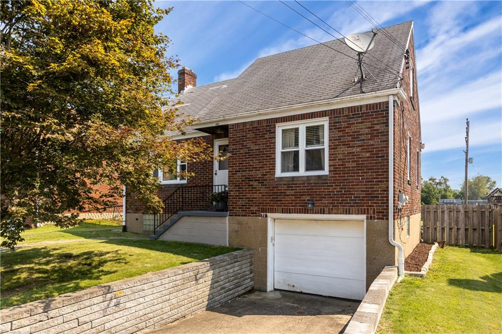 56 Elizabeth Street Pittsburgh, PA 15209 - Photo 2 of 30 a front view of a house with entertaining space