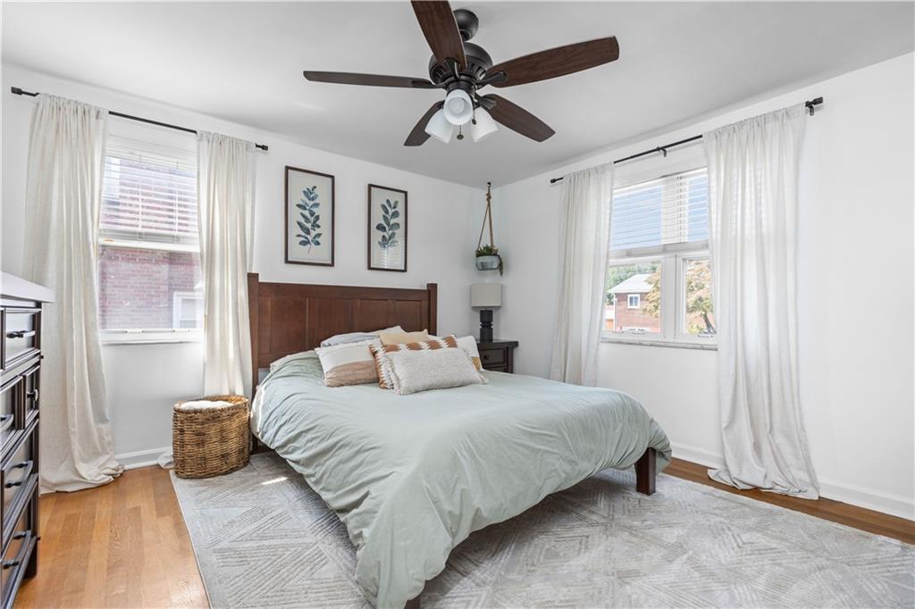 56 Elizabeth Street Pittsburgh, PA 15209 - Photo 21 of 30 a bedroom with a large bed and a window