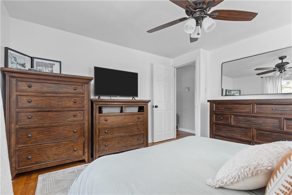 56 Elizabeth Street Pittsburgh, PA 15209 - Photo 22 of 30 a bedroom with a bed and a television