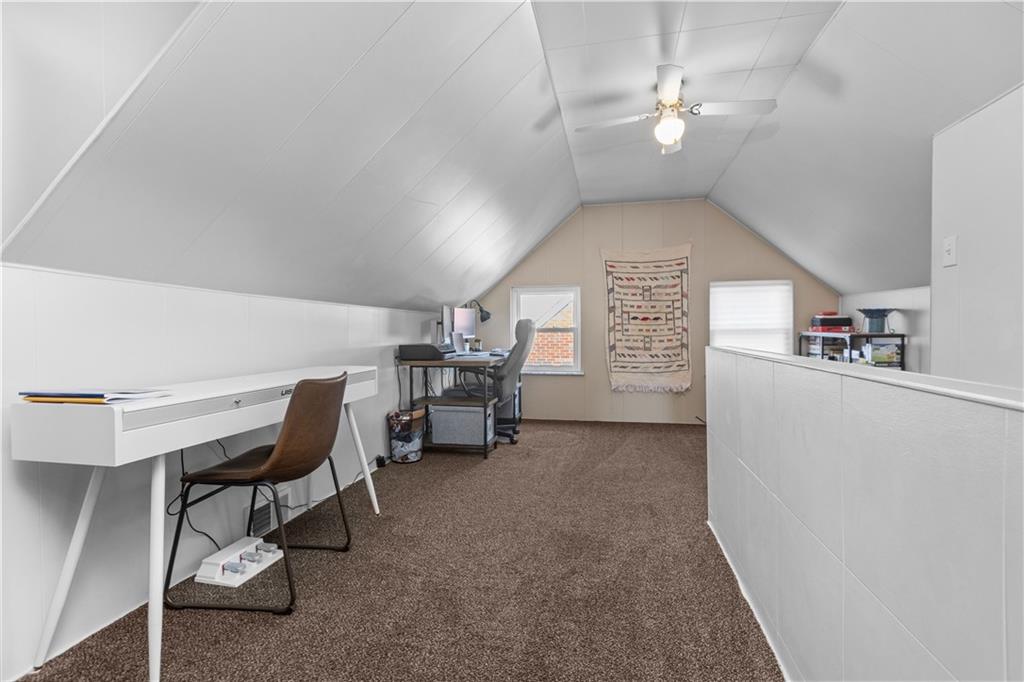 56 Elizabeth Street Pittsburgh, PA 15209 - Photo 24 of 30 a view of a livingroom with furniture and a ceiling fan