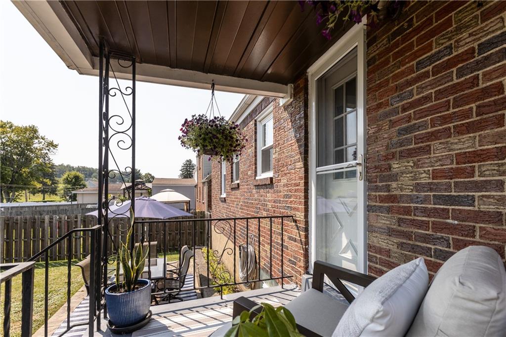 56 Elizabeth Street Pittsburgh, PA 15209 - Photo 4 of 30 a view of balcony with couch