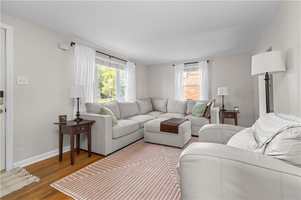 56 Elizabeth Street Pittsburgh, PA 15209 - Photo 10 of 30 a living room with furniture and a window