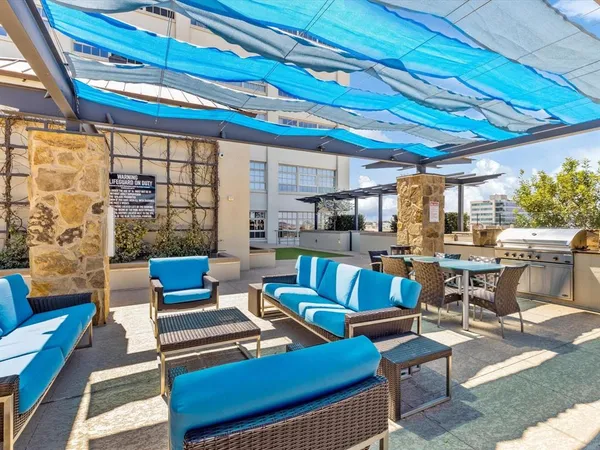 a outdoor space with patio the couches and a dining table with garden view