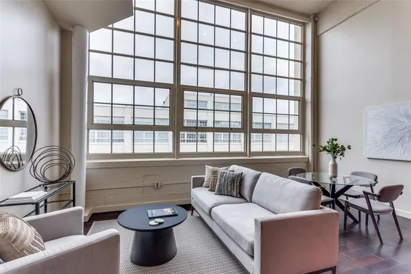 a living room with furniture and appliances