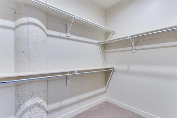 a livingroom with a table and a chair