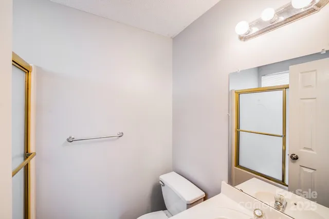 a view of a kitchen from the hallway