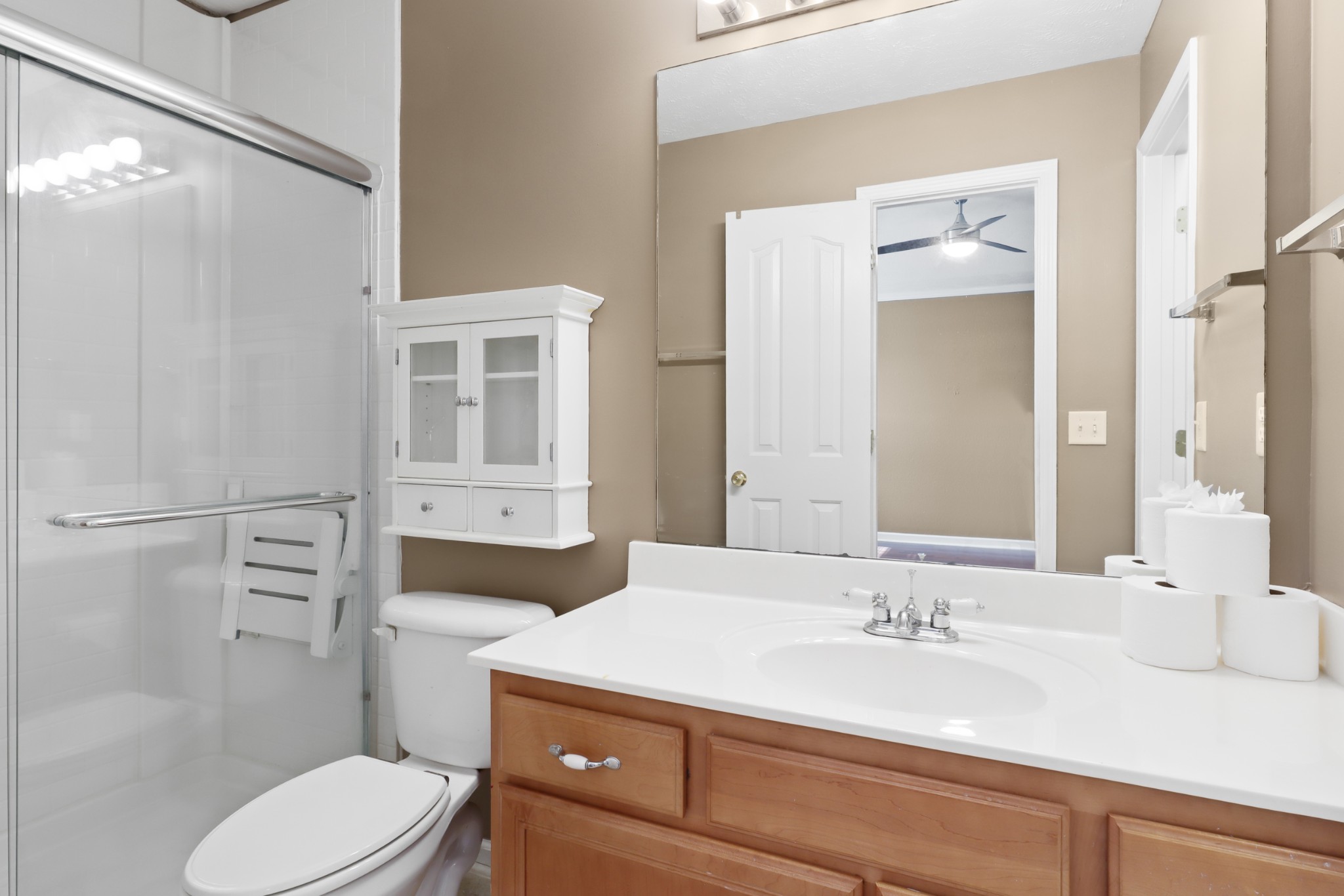 245 Shoshone Place Murfreesboro, TN 37128 - Photo 12 of 23 a bathroom with a granite countertop sink toilet a mirror and shower