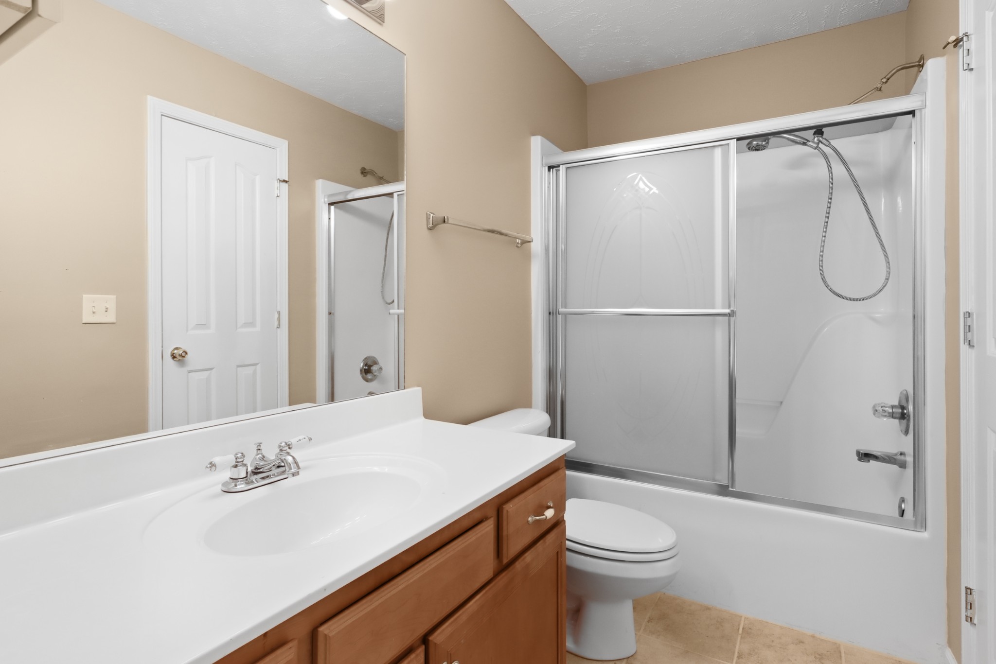 245 Shoshone Place Murfreesboro, TN 37128 - Photo 17 of 23 a bathroom with a sink a toilet and shower