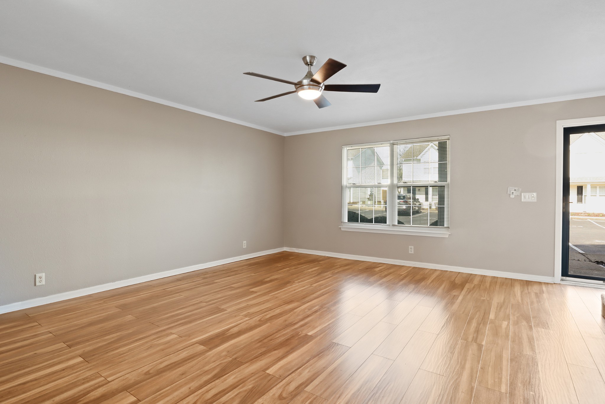 245 Shoshone Place Murfreesboro, TN 37128 - Photo 3 of 23 wooden floor in an empty room with a window