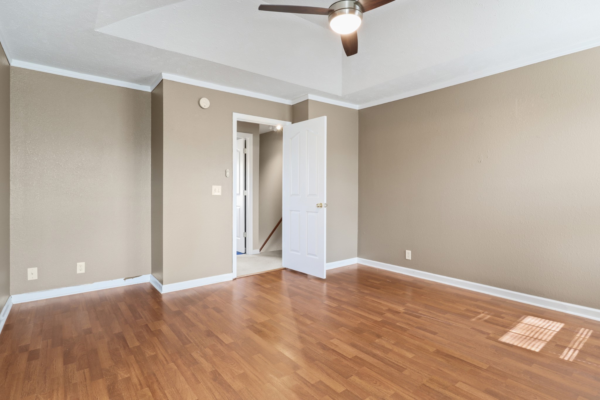 245 Shoshone Place Murfreesboro, TN 37128 - Photo 9 of 23 a view of an empty room with wooden floor
