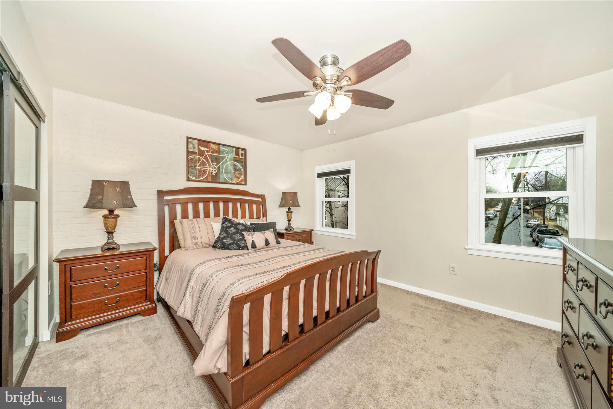 103 East 8th Street, Unit 103C Frederick, MD 21701 - Photo 17 of 34 a bedroom with a large bed and a window