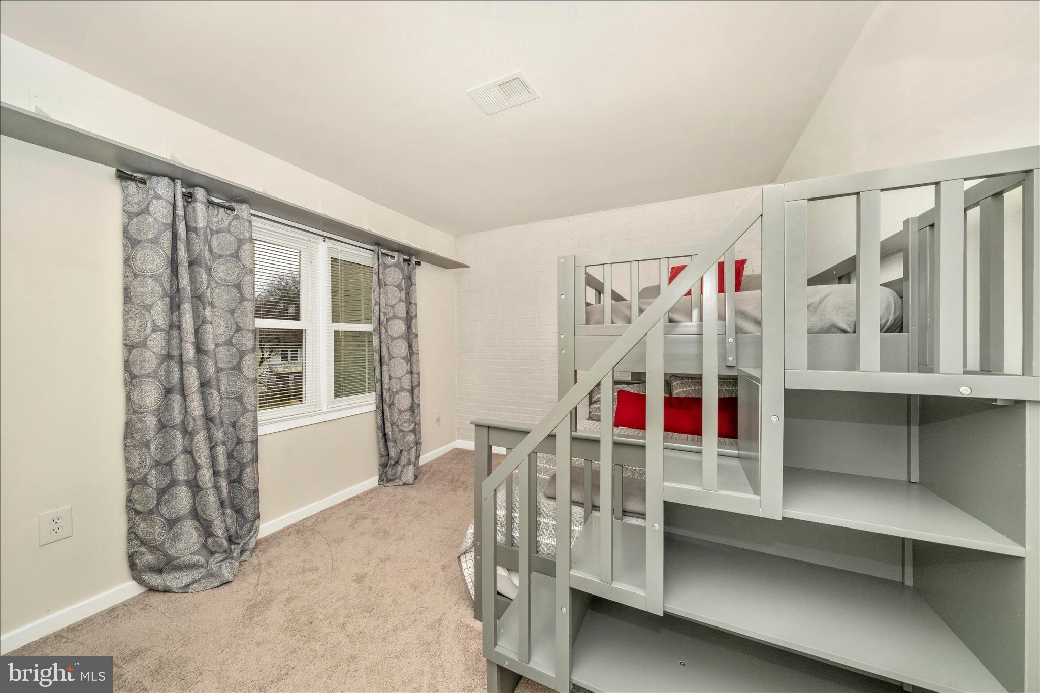 103 East 8th Street, Unit 103C Frederick, MD 21701 - Photo 21 of 34 a view of entryway and hall with wooden floor