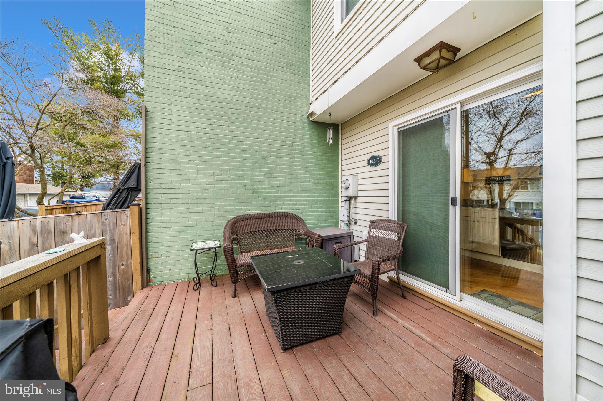 103 East 8th Street, Unit 103C Frederick, MD 21701 - Photo 28 of 34 a view of a balcony with chair and wooden floor